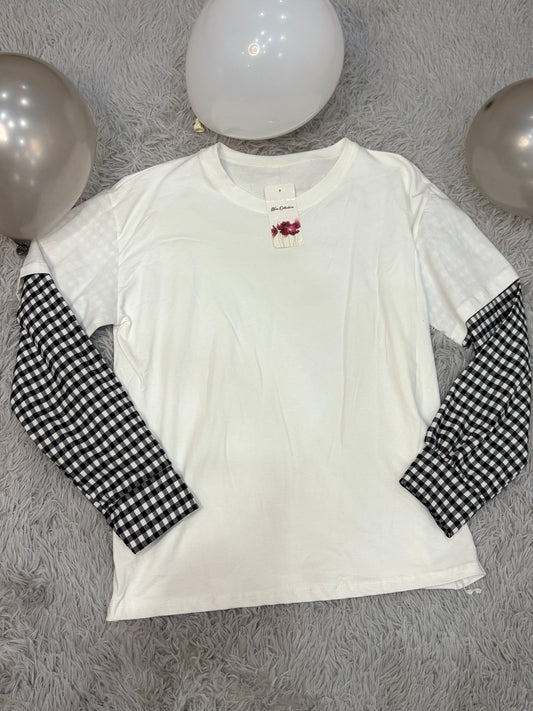 Maglia con maniche a quadri