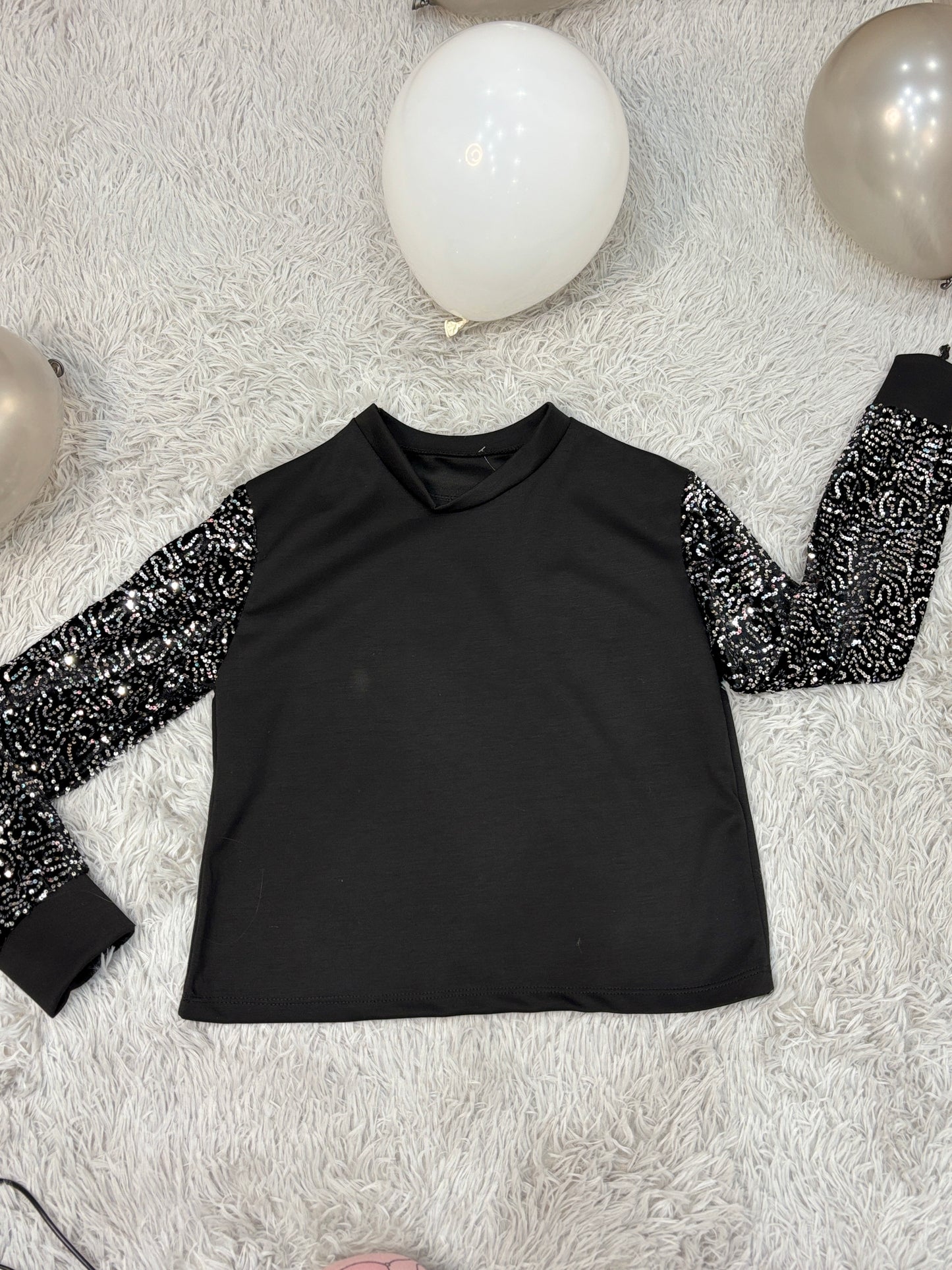 Felpa con maniche glitter