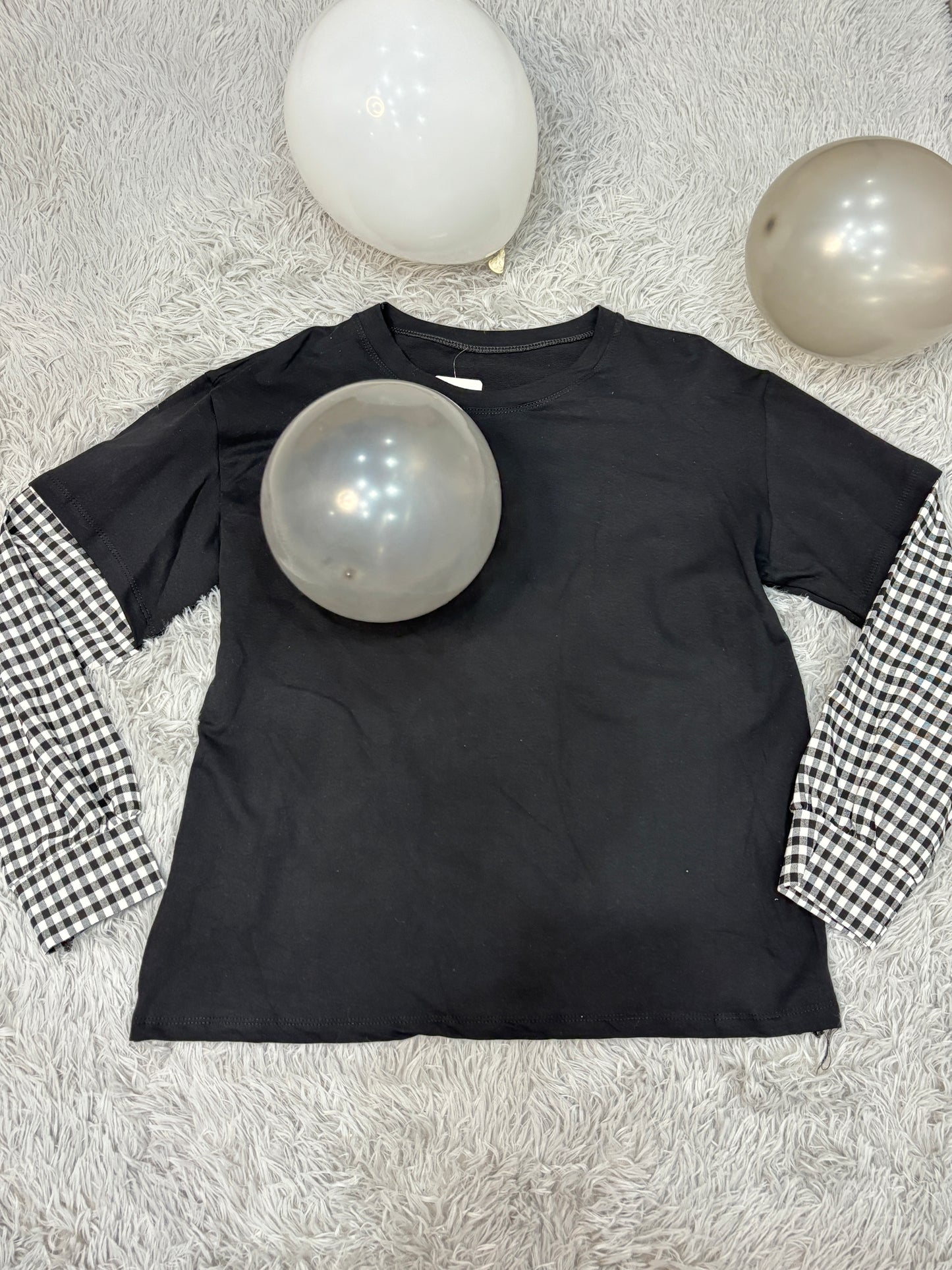 Maglia con maniche a quadri