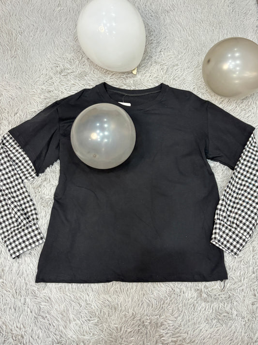 Maglia con maniche a quadri