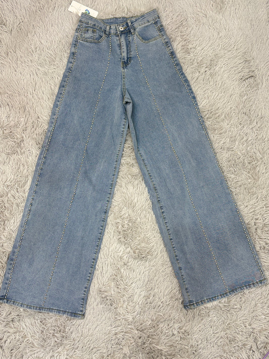 Jeans con borchie