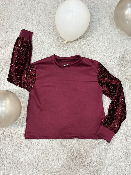 Felpa con maniche glitter
